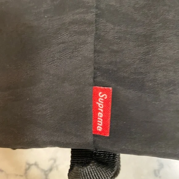 Black supreme cross body bag